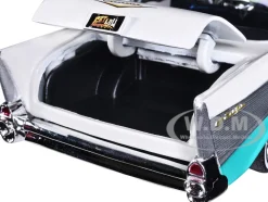 1957 Chevrolet Bel Air Lowrider Turquoise Metallic White Get Low Series 1/24 Diecast Model Car Motormax 79029