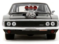 Dom's 1970 Dodge Charger R/T Black and Brian's Toyota Supra Orange with Graphics Set of 2 Cars