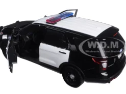 2015 Ford Interceptor Unmarked Police Car Black/White 1/24 Diecast Model Car Motormax 76958