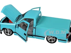 1988 GMC Sierra 1500 Custom Pickup Truck Light Blue with Black Stripes Limited Edition to 9250 pieces Worldwide 1/24 Diecast Model Car by M2 Machines
