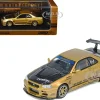 Nissan Skyline GT-R (R34) RHD (Right Hand Drive) "Top Secret" Gold Metallic with Carbon Hood and Trunk 1/64 Diecast Model Car by Inno Models