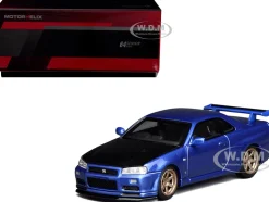 Nissan Skyline GT-R (R34) V-Spec II RHD (Right Hand Drive) Bayside Blue Metallic with Carbon Hood