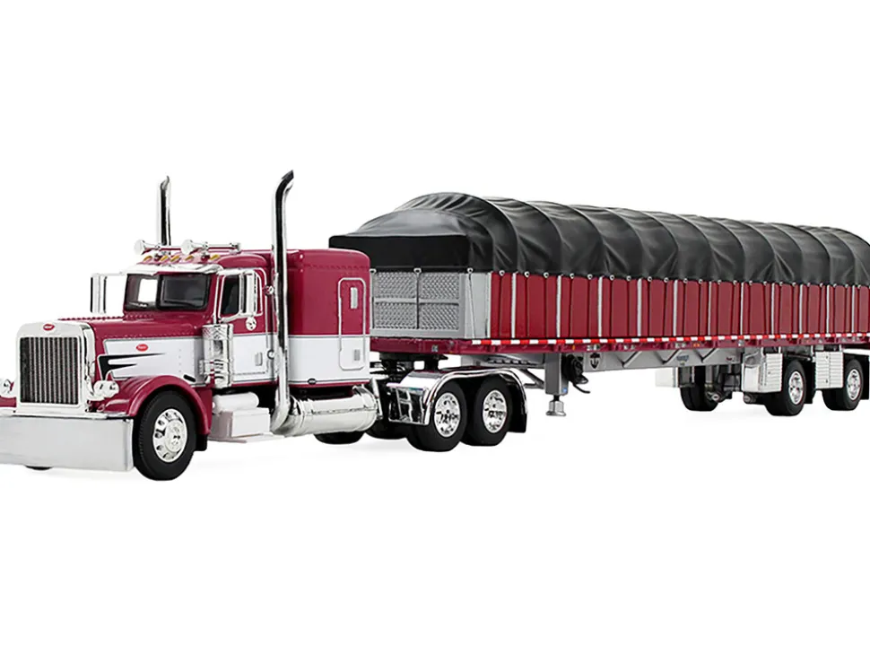 Peterbilt 389 with 63" Flat Top Sleeper and 53’ Wilson Roadbrute Flatbed Trailer with Covered Wagon Maroon with White Stripes 1/64 Diecast Model by DCP/First Gear