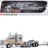 Peterbilt 389 with 70" Mid-Roof Sleeper and Fontaine Magnitude Tri-Axle Lowboy Trailer with Jeep "Capitola Trucking" Gray with Orange Stripes 1/64 Diecast Model by DCP/First Gear