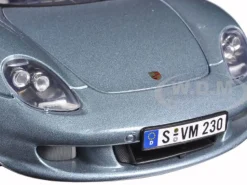 Porsche Carrera GT Silver with Black Interior 1/18 Diecast Model Car Motormax 73163
