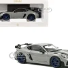 2023 Porsche Cayman GT4 RS Weissach Pack Chalk Gray with Carbon Hood Stripes 1/18 Diecast Model Car by Norev