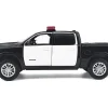 2019 RAM 1500 Laramie Crew Cab Pickup Truck Black and White with Flashing Light Bar and Front and Rear Lights and Sounds 1/27 Diecast Model Car by Motormax
