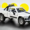 1985 Toyota Hilux SR5 Pickup Truck White with Black Graphics "Collection" Series 1/64 Diecast Model Car by Majorette
