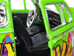 1966 Volkswagen Beetle Green with Graffiti Graphics 1/24 Diecast Model Car by Motormax